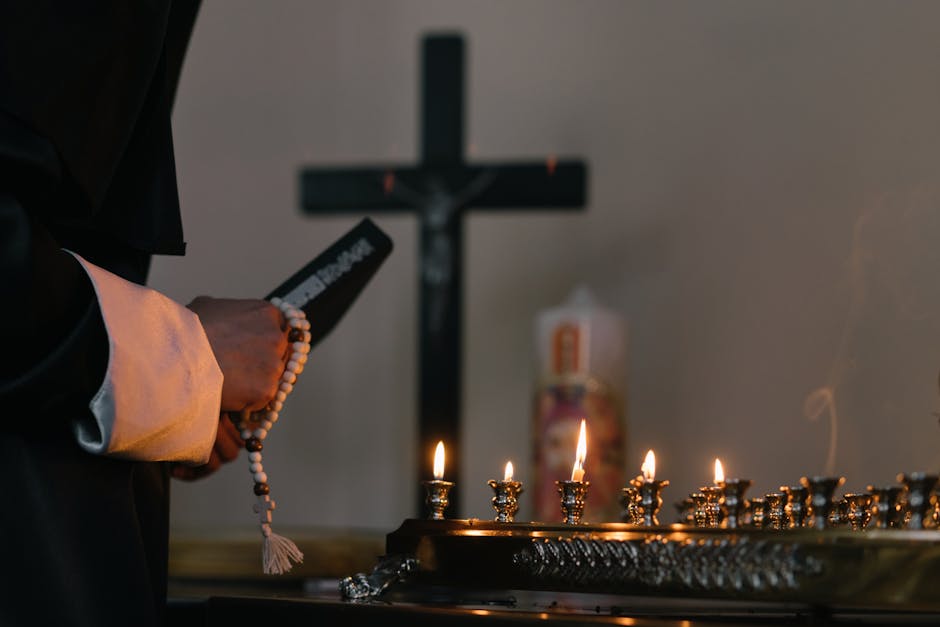 Candles cross prayer beads