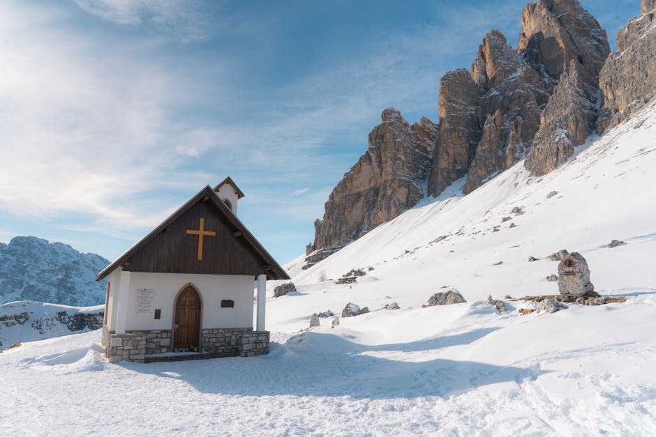 Serene chapel snowy peaks