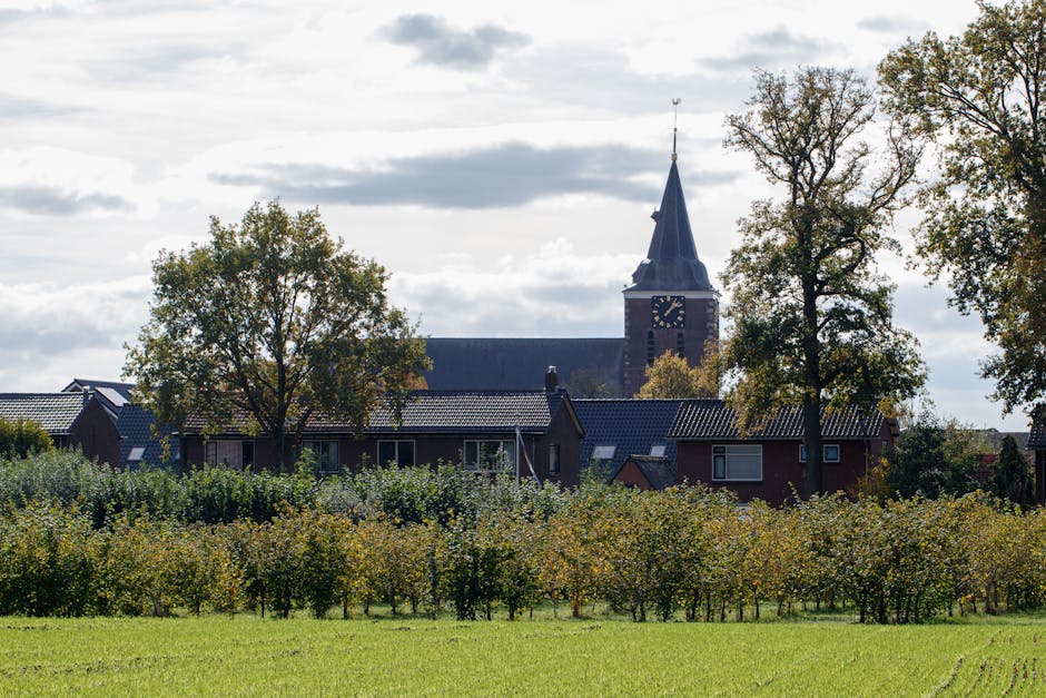 Church steeple in a rural landscape