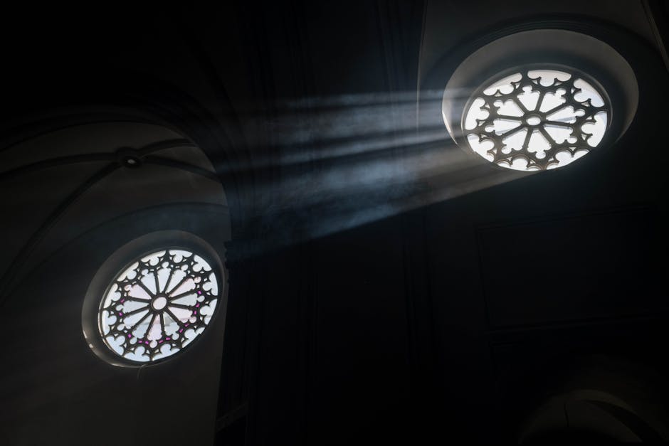 Sunlight rays through ornate windows