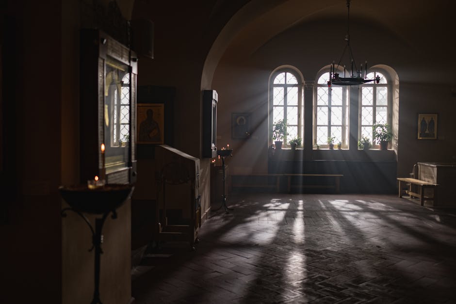 Sunlight streaming through stained glass church windows