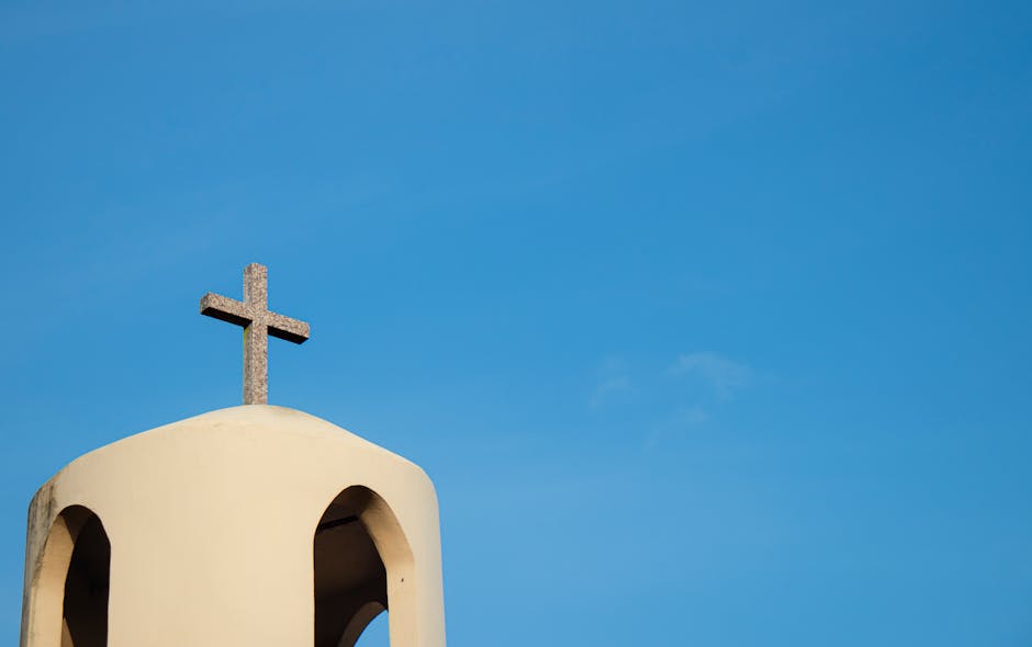 Tower cross clear blue sky