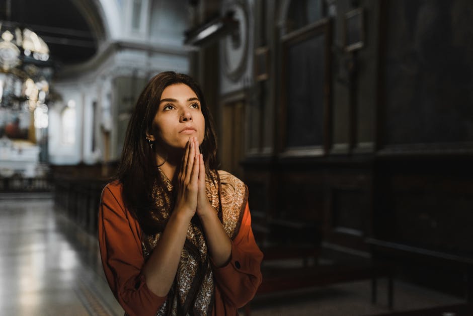 Woman praying dim light