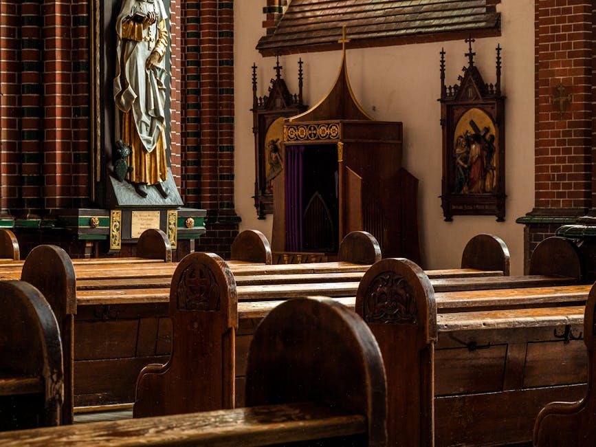 Wooden pews brick interior