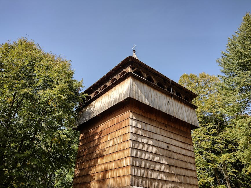 Wooden tower green trees sky